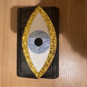 Kurt Geiger Black Clutch with Gold Sequin Eye and Blue Accent